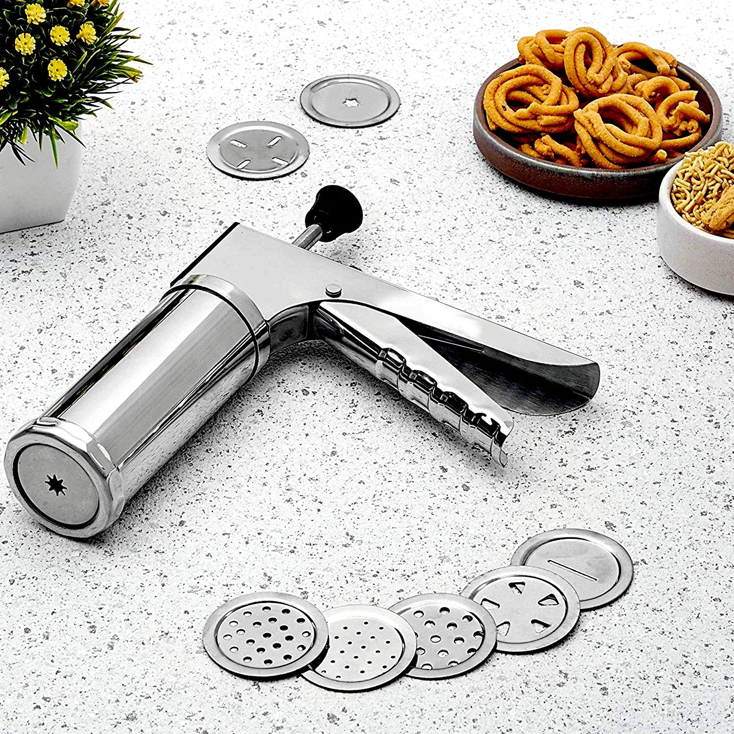 Wukusy 15-in-1 stainless steel kitchen press with multiple attachments for versatile food preparation and pressing tasks.