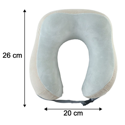 Beige U-shaped memory foam travel neck pillow with buckle strap for neck support and comfort during trips.