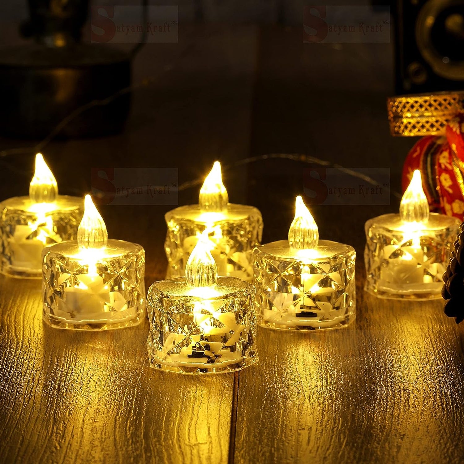 Wukusy 24-pack flameless acrylic LED tea light candles, transparent decorative candles for festive home decor and gifting.