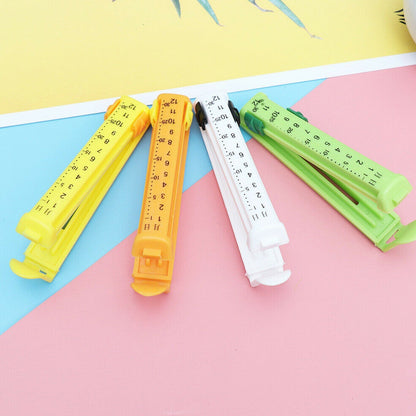 Wukusy 6309 4-piece food sealing clips for sealing packed food to prevent contamination in the kitchen.