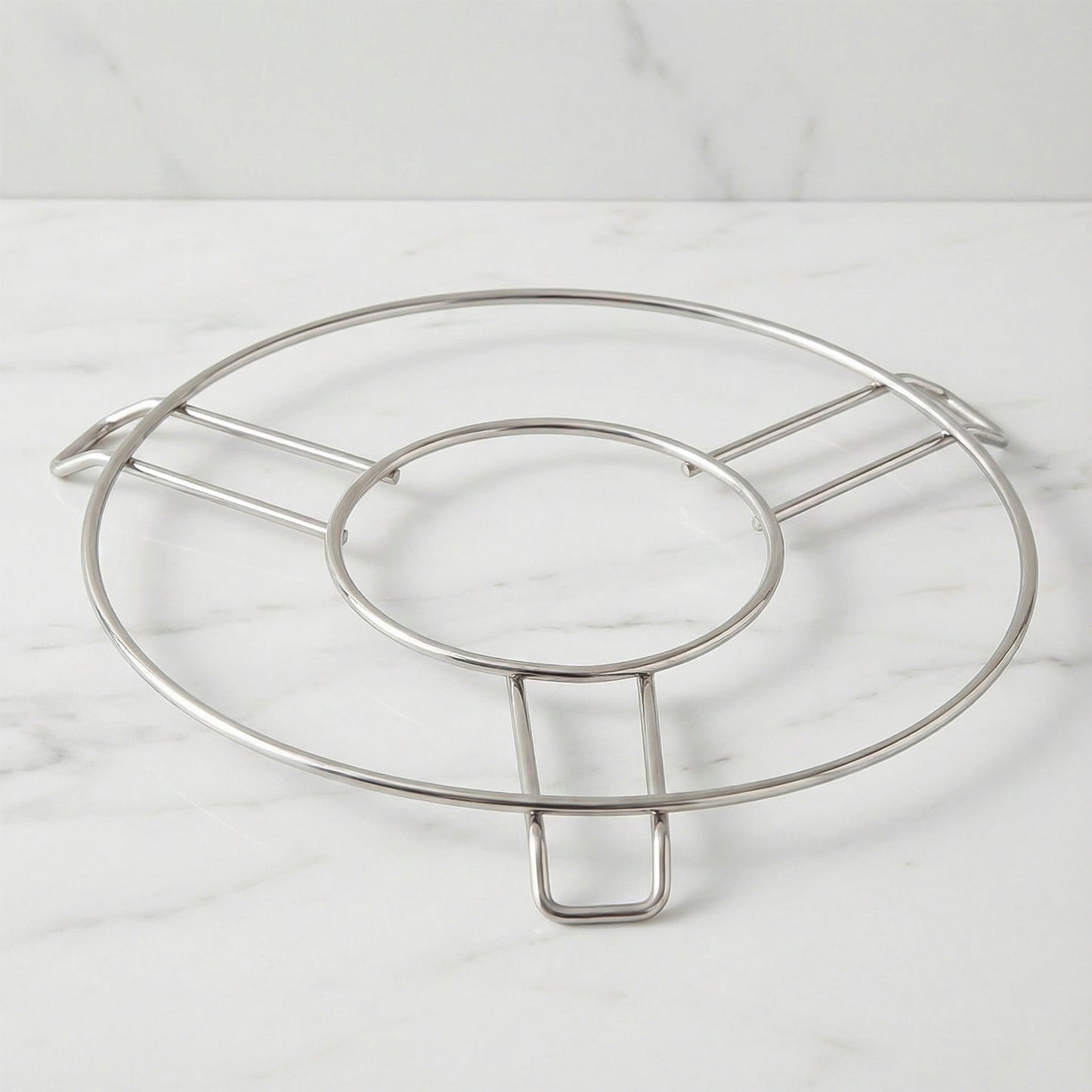 Wukusy stainless steel round hot pot stand, perfect for home kitchen table, supporting hot pots securely and evenly.