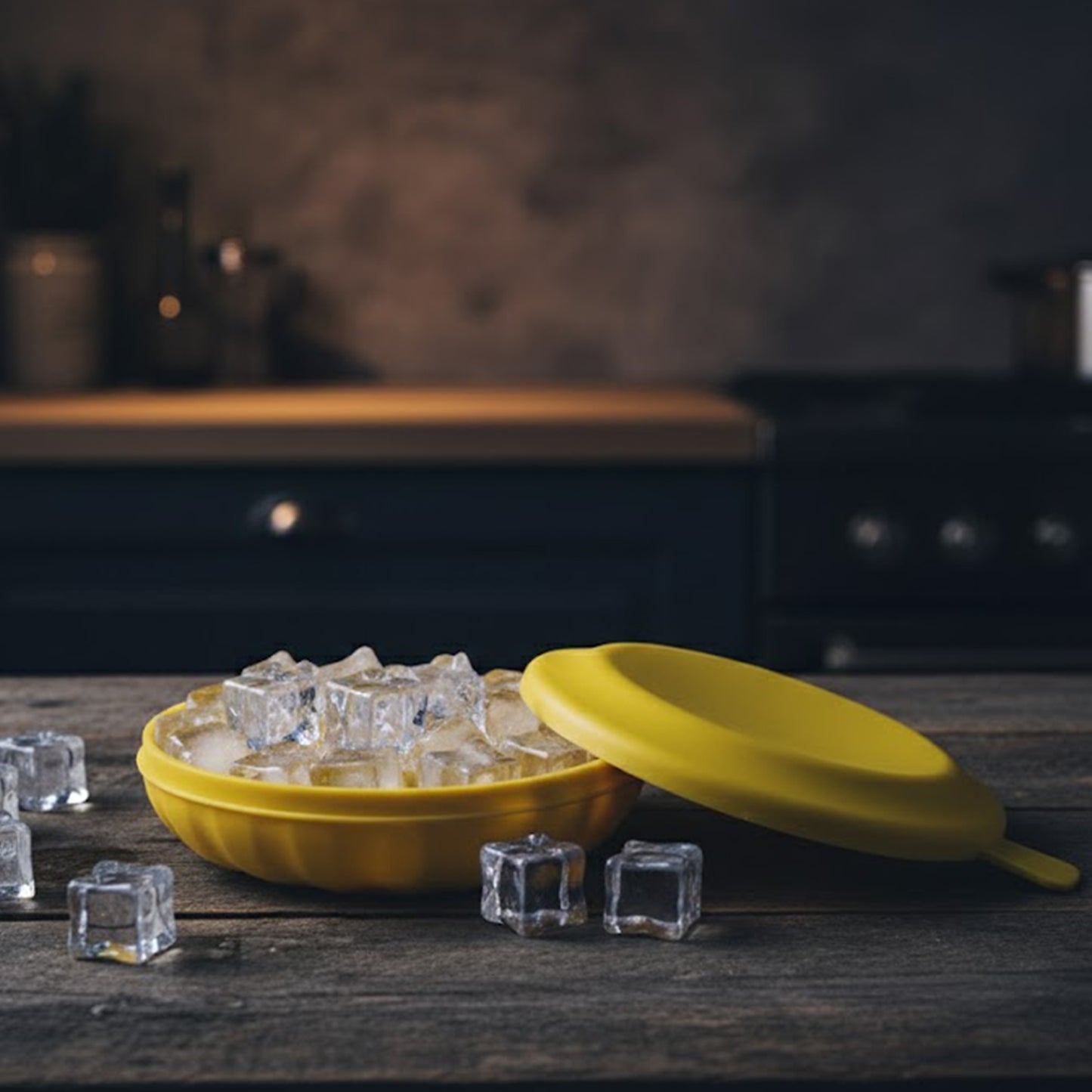 Wukusy premium round ice cube tray with lid showing 12 round ice cubes in a clear tray on a kitchen countertop