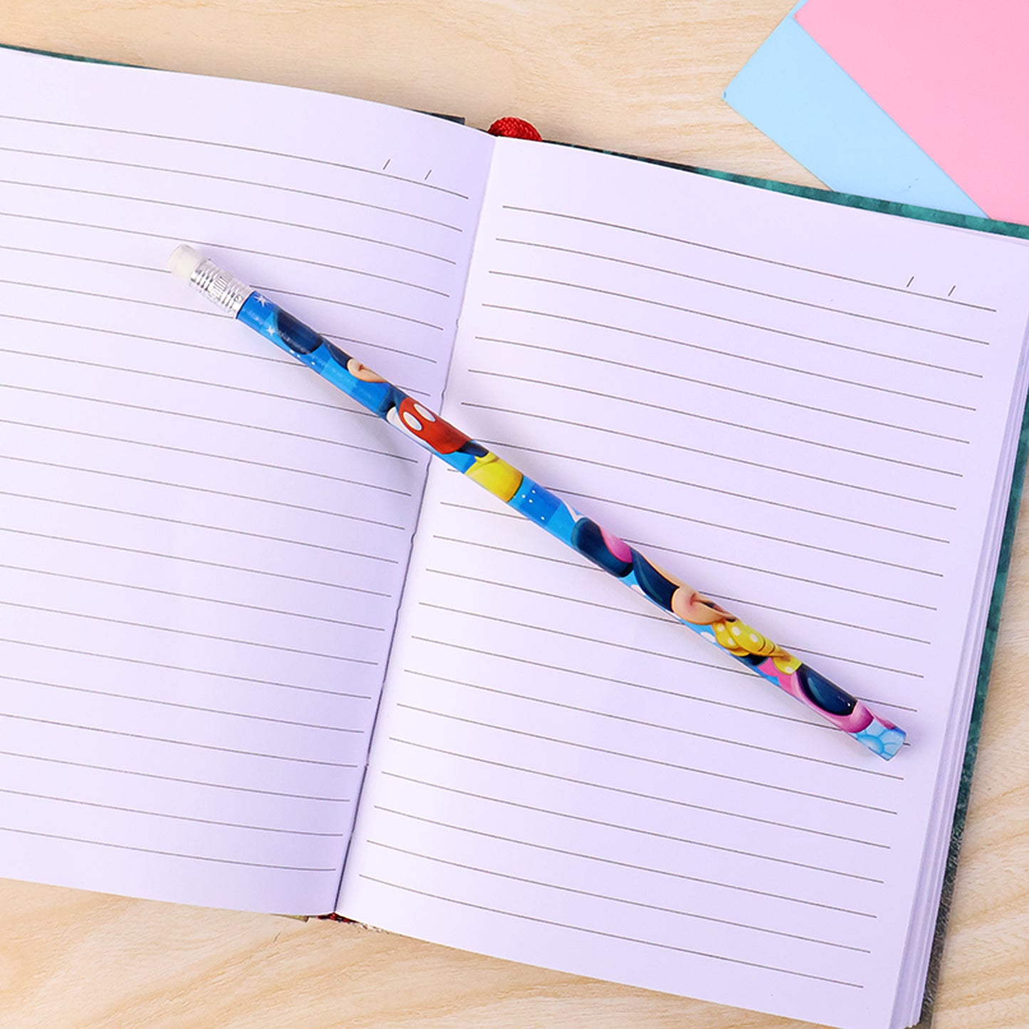 Set of 12 Wukusy premium cartoon-printed graphite pencils for office use, featuring colorful cartoon designs on each pencil.
