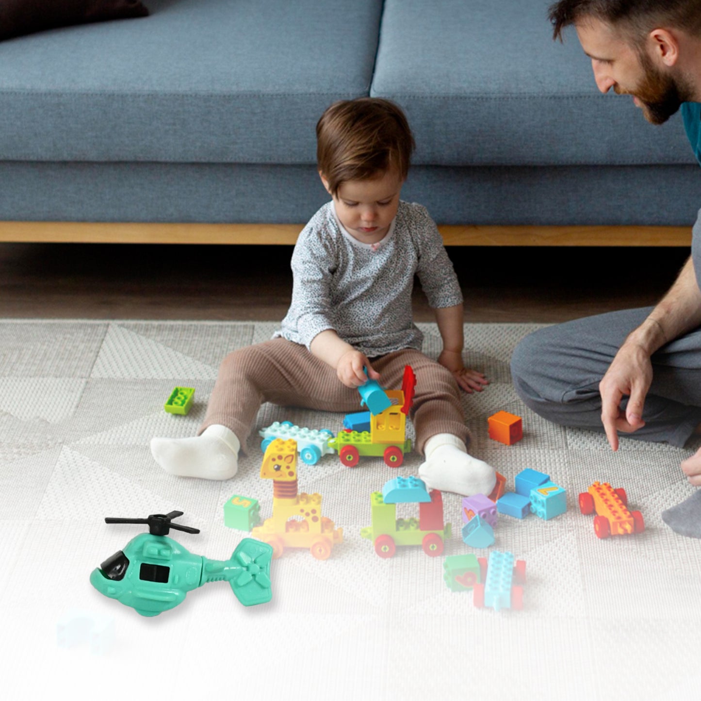 Wukusy small DIY helicopter toy for kids with rotating tail and wings, colorful plastic construction for imaginative play.