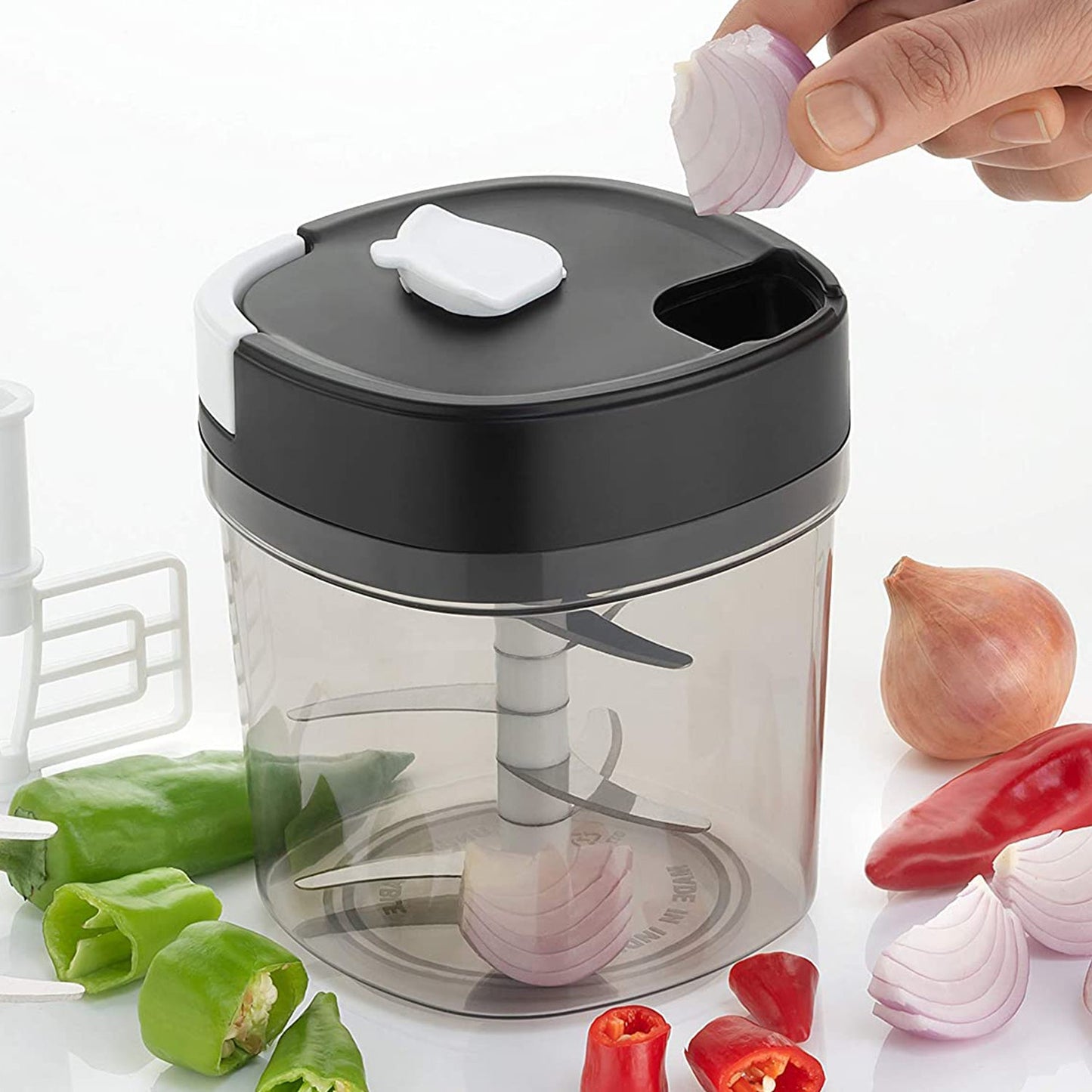 Wukusy 2-in-1 handy chopper and slicer for fruits, vegetables, cheese; compact kitchen tool for chopping and slicing tasks.