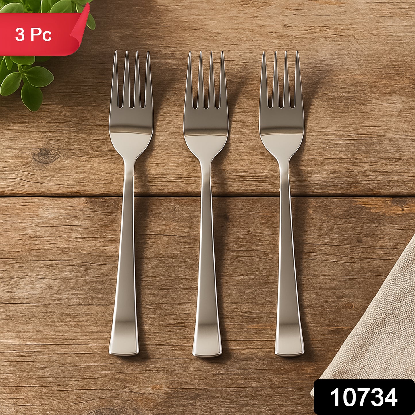 Three Wukusy premium stainless steel dinner forks arranged on a kitchen table, showcasing their polished finish and ergonomic design.