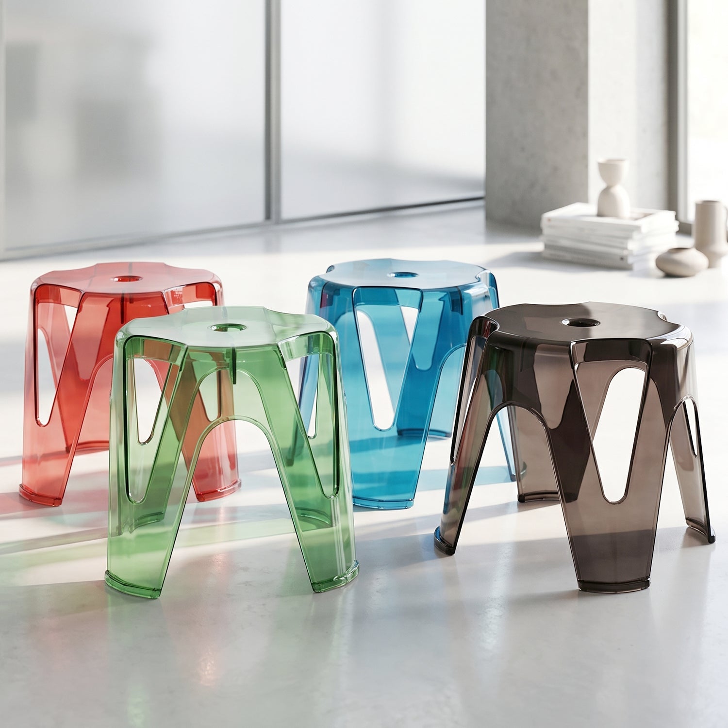 Set of four Wukusy transparent plastic sitting stools, 28x26cm, sturdy indoor and outdoor seats shown stacked and arranged.