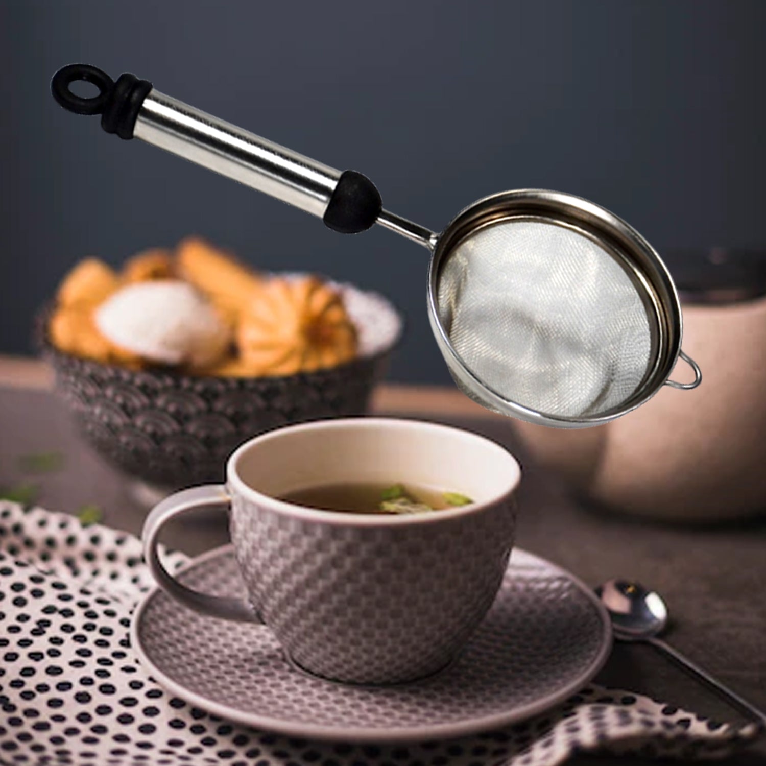 Wukusy stainless steel soup and tea strainer with fine mesh for filtering liquids in kitchen use.