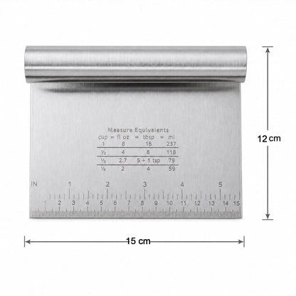 Small Wukusy stainless steel dough scraper cutter with scale, measuring 15x12 cm, shown on a kitchen surface with dough.