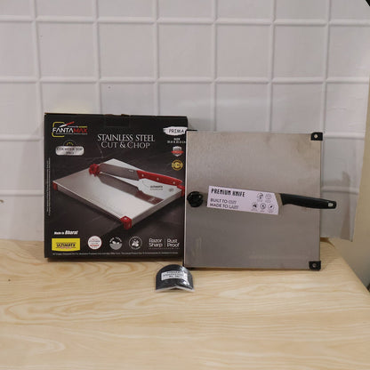 Wukusy stainless steel 2-in-1 cut and chop board with knife and sharpener, showing sleek design and included accessories.