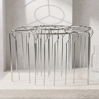 Stainless steel Wukusy air fryer skewer stand with BBQ kebab rack holder for grilling and kebab preparation.