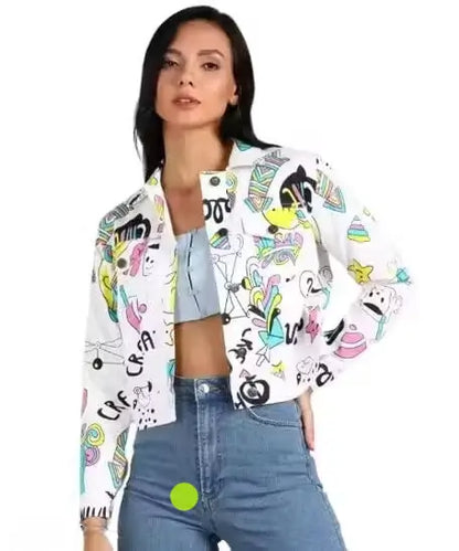 Women’s printed denim jacket by Ekom, casual outerwear featuring colorful floral patterns on classic blue denim fabric.