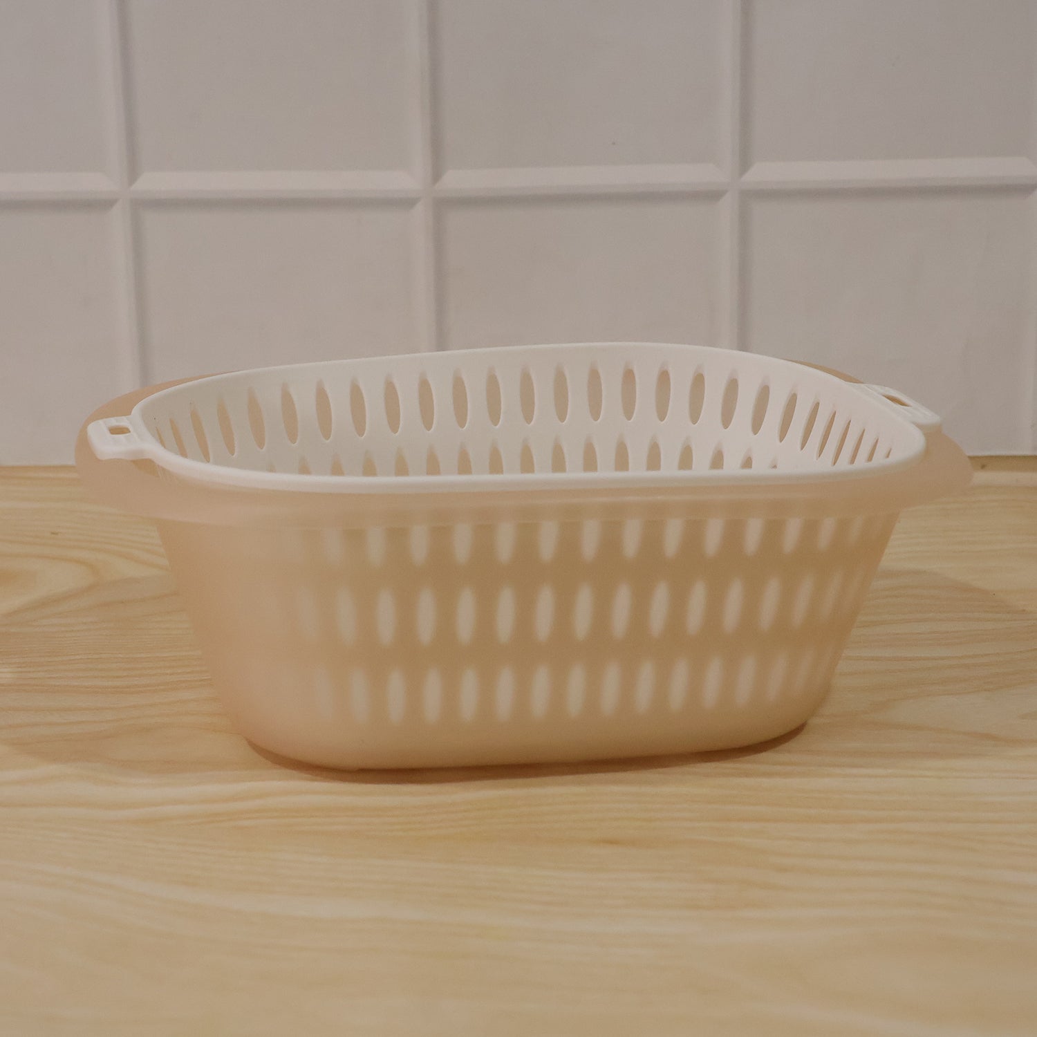 Wukusy 2-in-1 plastic double drain basket and colander set with washing bowl, ideal for rinsing and draining vegetables.
