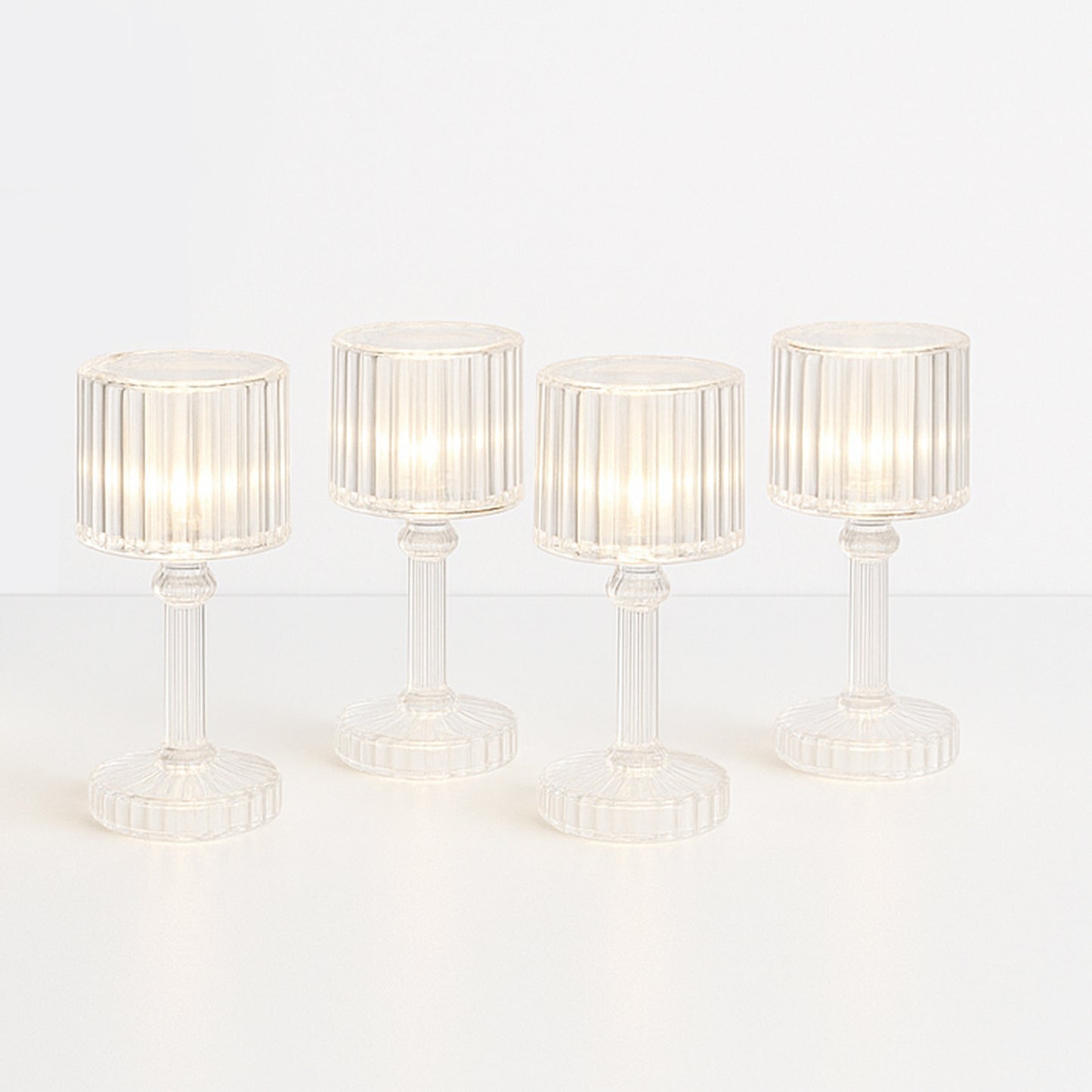 Set of 4 Wukusy LED crystal-effect table lamps for home decor, featuring modern design with shimmering crystal details.
