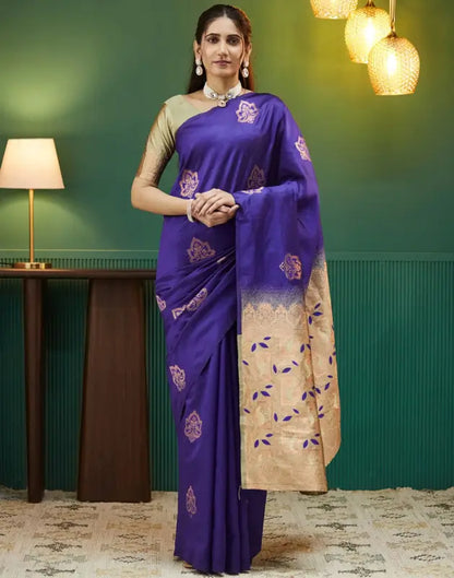 Elegant women’s silk saree from Ekom's Royal Green Golden Elegance Collection with intricate gold and green design.