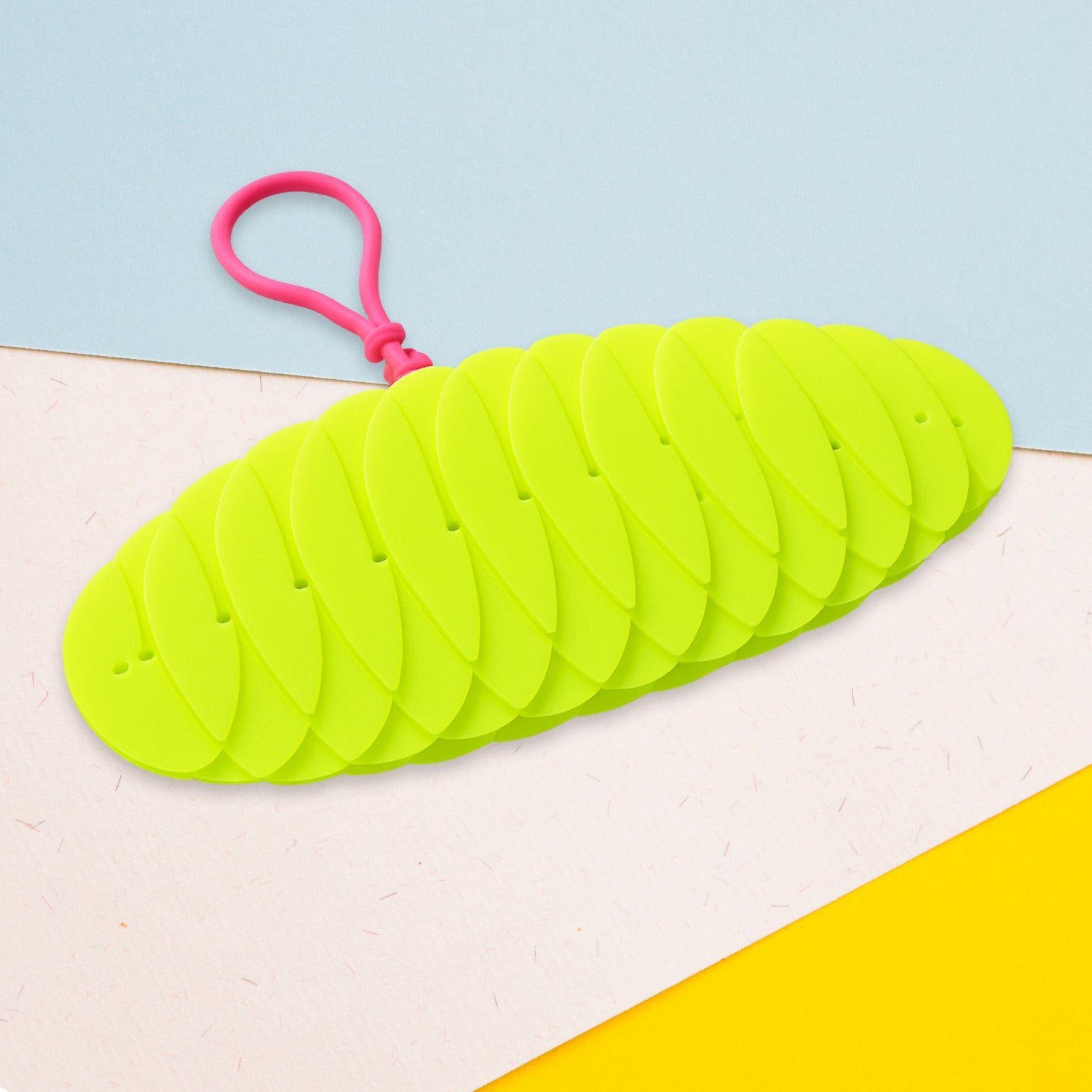 Flexible plastic worm fidget toy from Wukusy, showcasing its colorful, bendable design perfect for stress relief and sensory play.