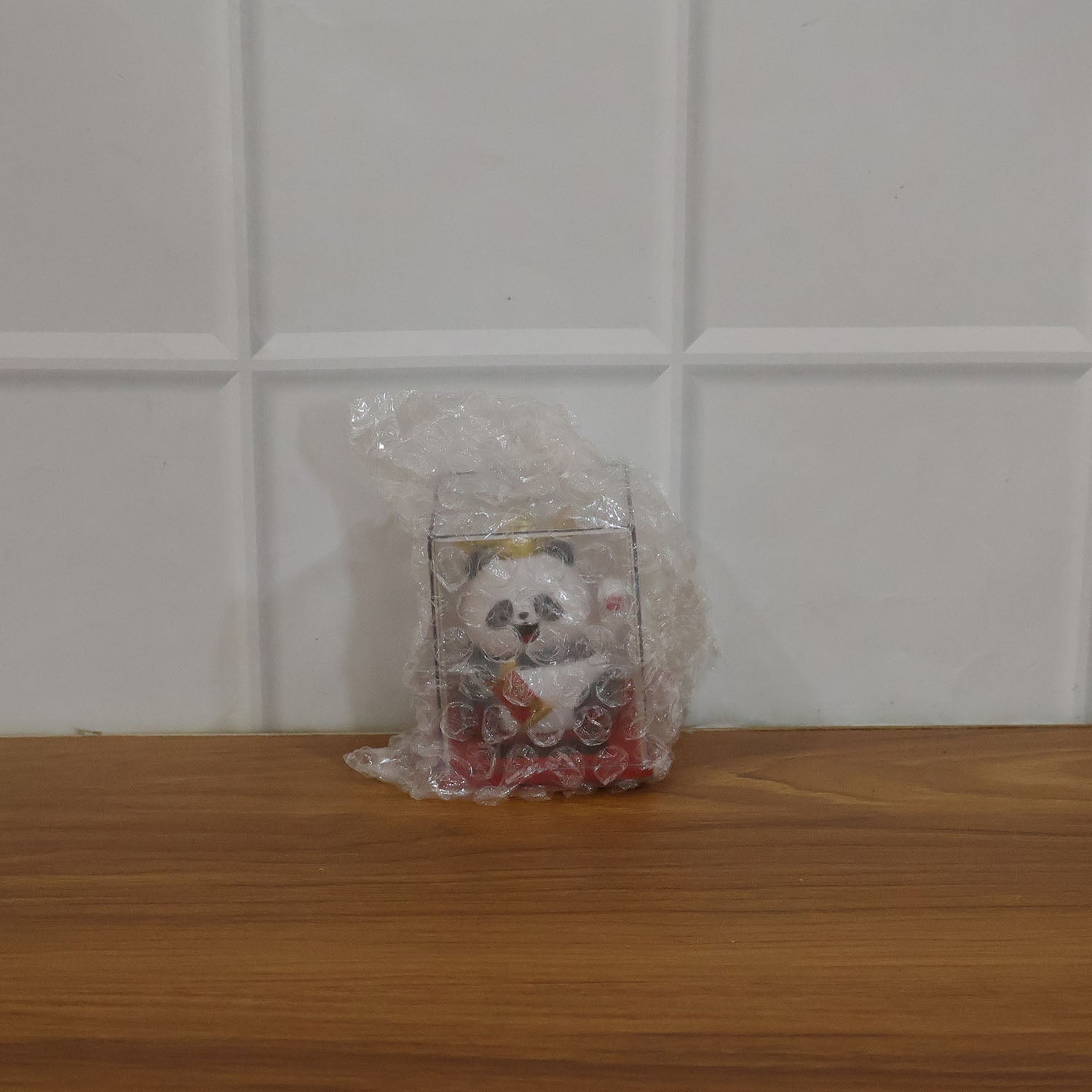 Solar powered moving hand panda showpiece by Wukusy, featuring a cute panda with a hand that moves when exposed to sunlight.
