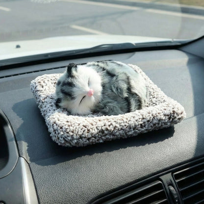 Soft plush Wukusy closed-eye cat dashboard toy with cute design, perfect for car decor and pet lovers.