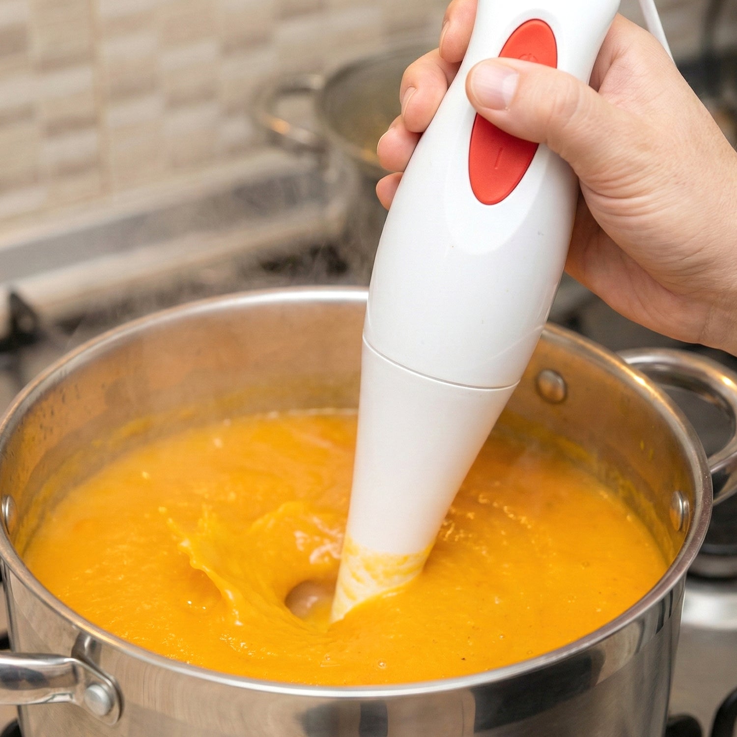 Wukusy electric hand blender stick with stainless steel blending arm and control buttons, designed for versatile kitchen use