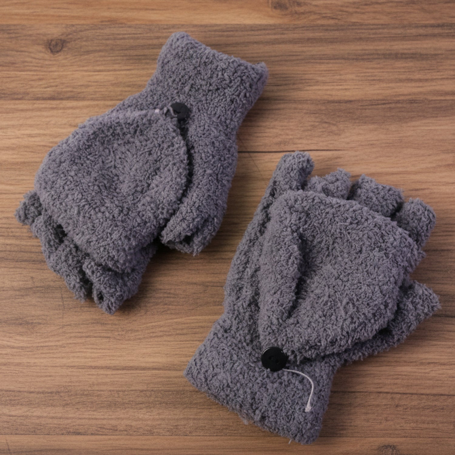 Pair of Wukusy winter fingerless gloves for men and women, soft, warm hand gloves shown in the image.
