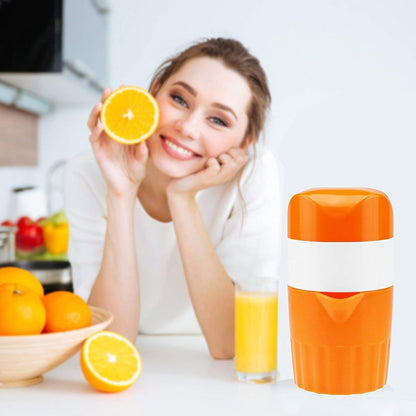Wukusy manual handheld citrus juicer for oranges and lemons, with a sturdy fruit press and squeeze extractor in home kitchen use