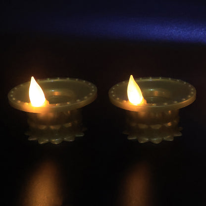 Set of 12 Wukusy water sensor LED golden diyas for home decor, featuring illuminated, decorative traditional Indian oil lamps.