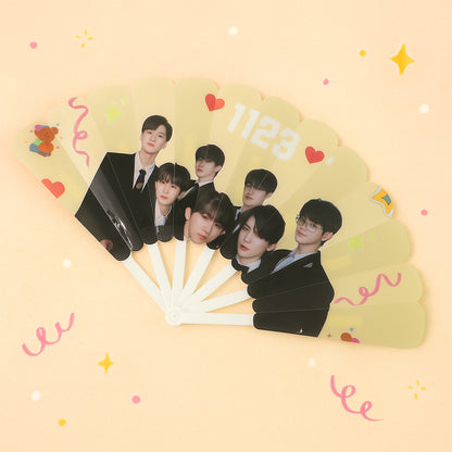 Wukusy idol-themed foldable hand fan with decorative design, lightweight and portable for home or personal use.
