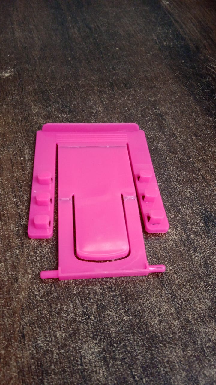 Adjustable foldable plastic mobile phone stand holder by Wukusy showing a compact design with a phone placed on the holder.