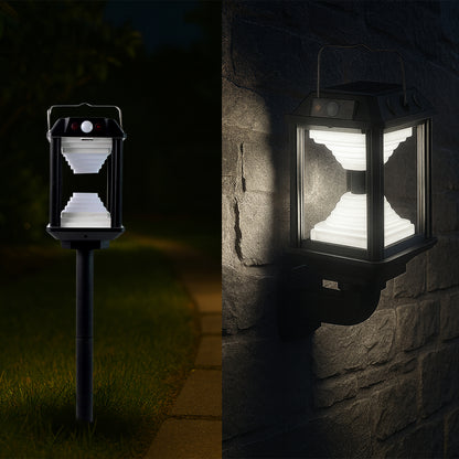Wukusy premium solar induction LED wall lamp with motion sensor mounted on garden wall, illuminating outdoor space at night.