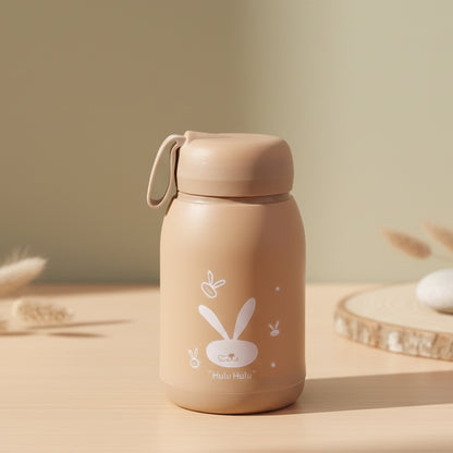 Wukusy cute bunny print glass drinking bottle with brown tint, 330ml capacity, featuring adorable bunny illustrations on the surface.