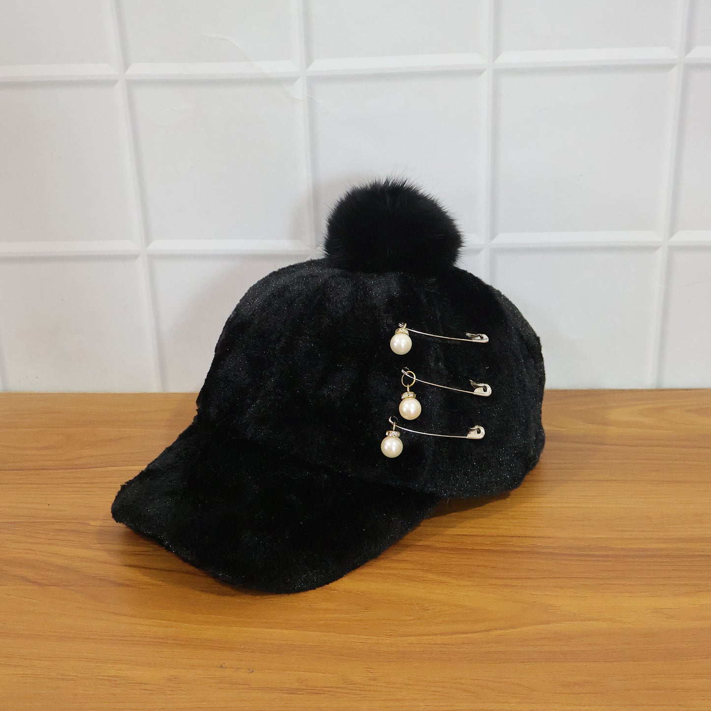 Wukusy elegant winter fur cap for women, featuring soft plush fur and stylish design, ideal for cold weather.