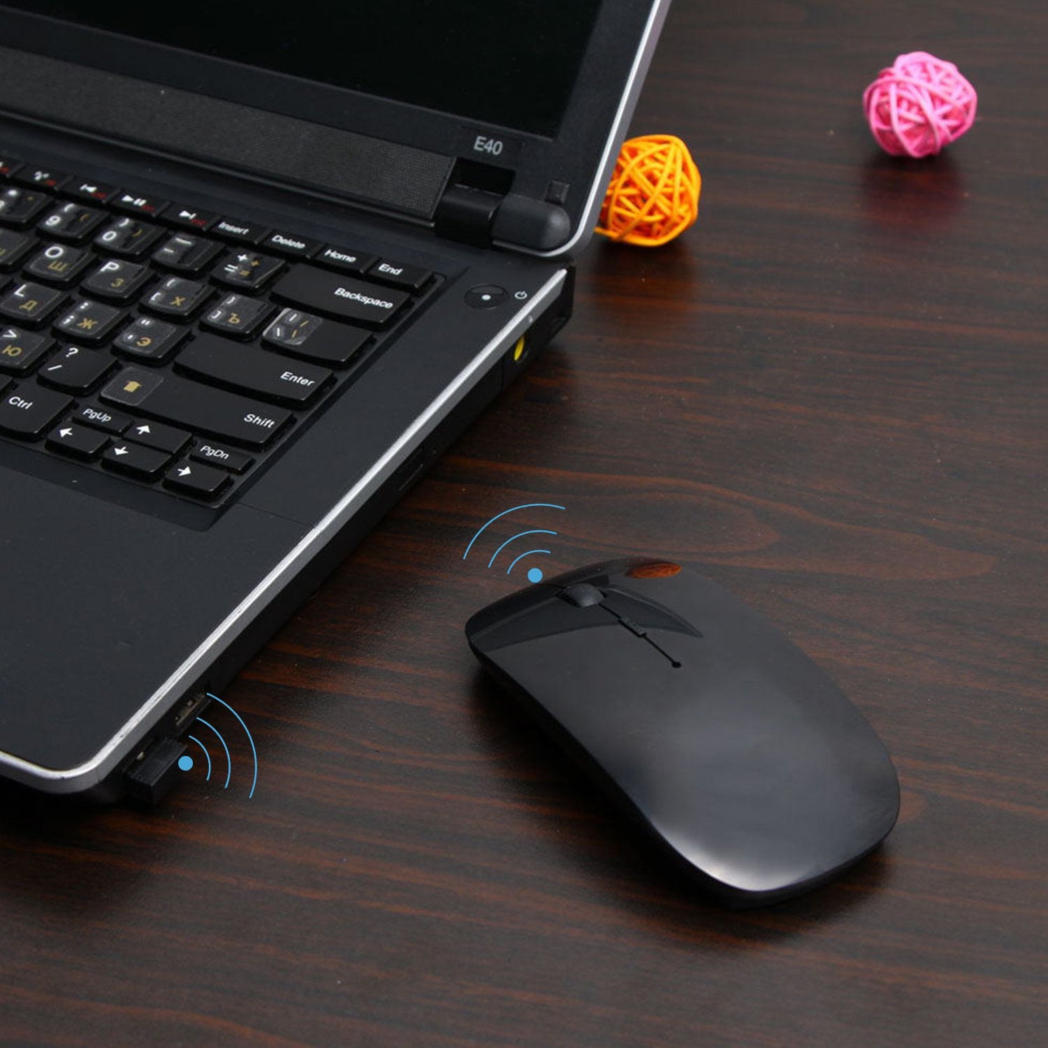 Wukusy wireless office mouse for laptop, Mac, and iPad Pro, featuring ergonomic design and smooth scrolling functionality.