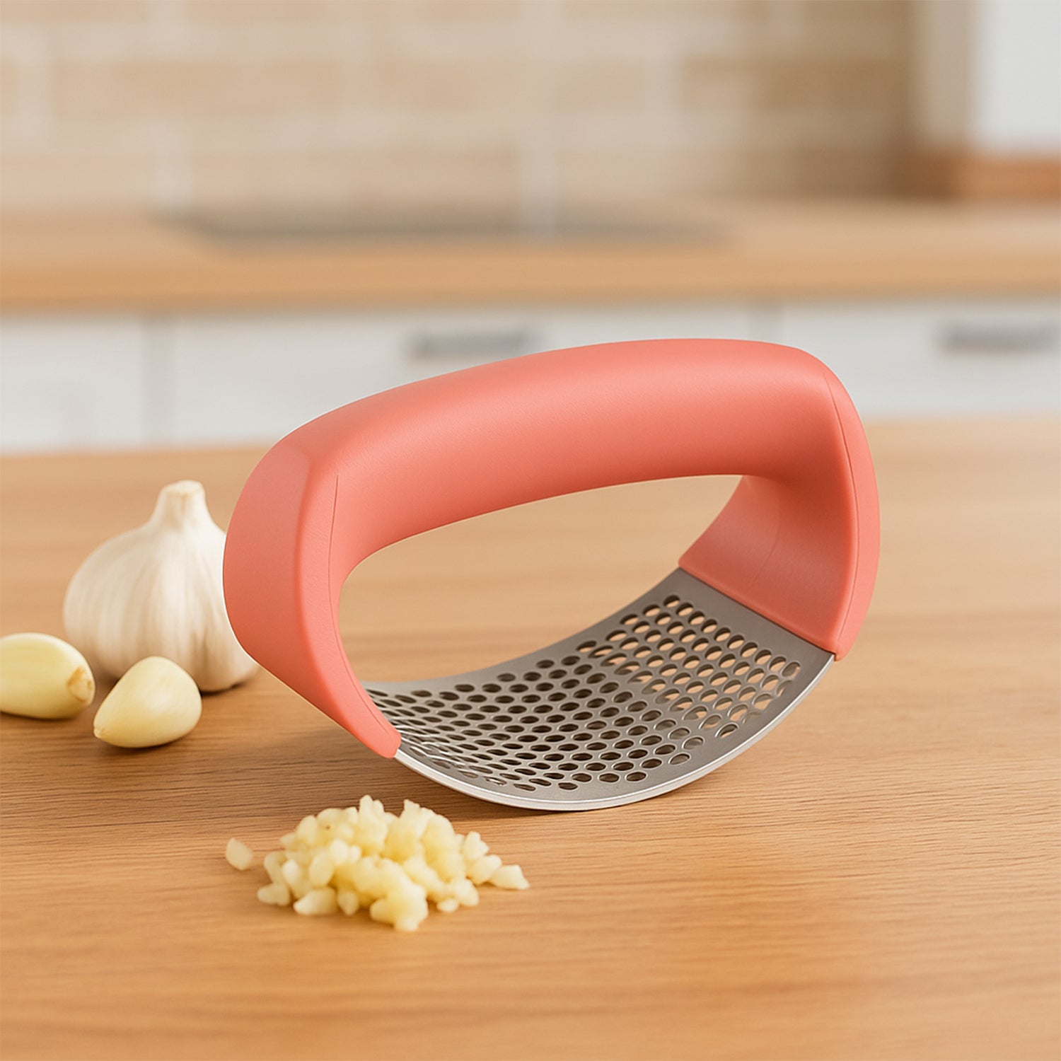 Wukusy Supermom Premium Curve Garlic Press Crusher for home kitchen use, featuring a curved design and sturdy construction.