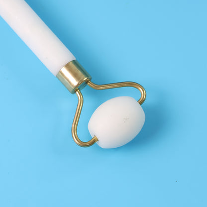 Wukusy dual-ended face massage roller with textured and smooth surfaces for facial skin relaxation and rejuvenation.