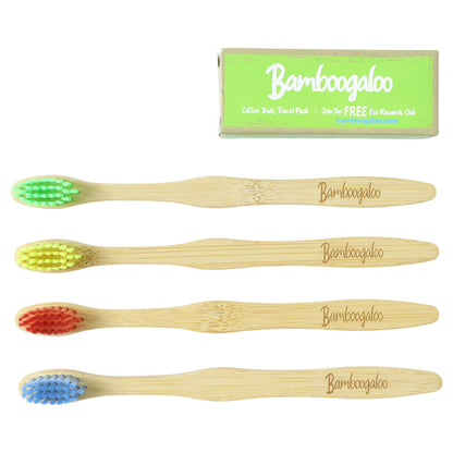 Set of four Wukusy bamboo toothbrushes for adults with eco-friendly wooden handles and soft bristle heads.