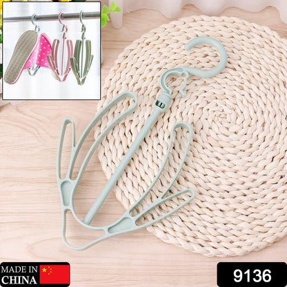 Wukusy 9136 Shoes Drying Hanger, rotatable shoe rack for balcony or closet, made of durable material with multiple hanging shoes.