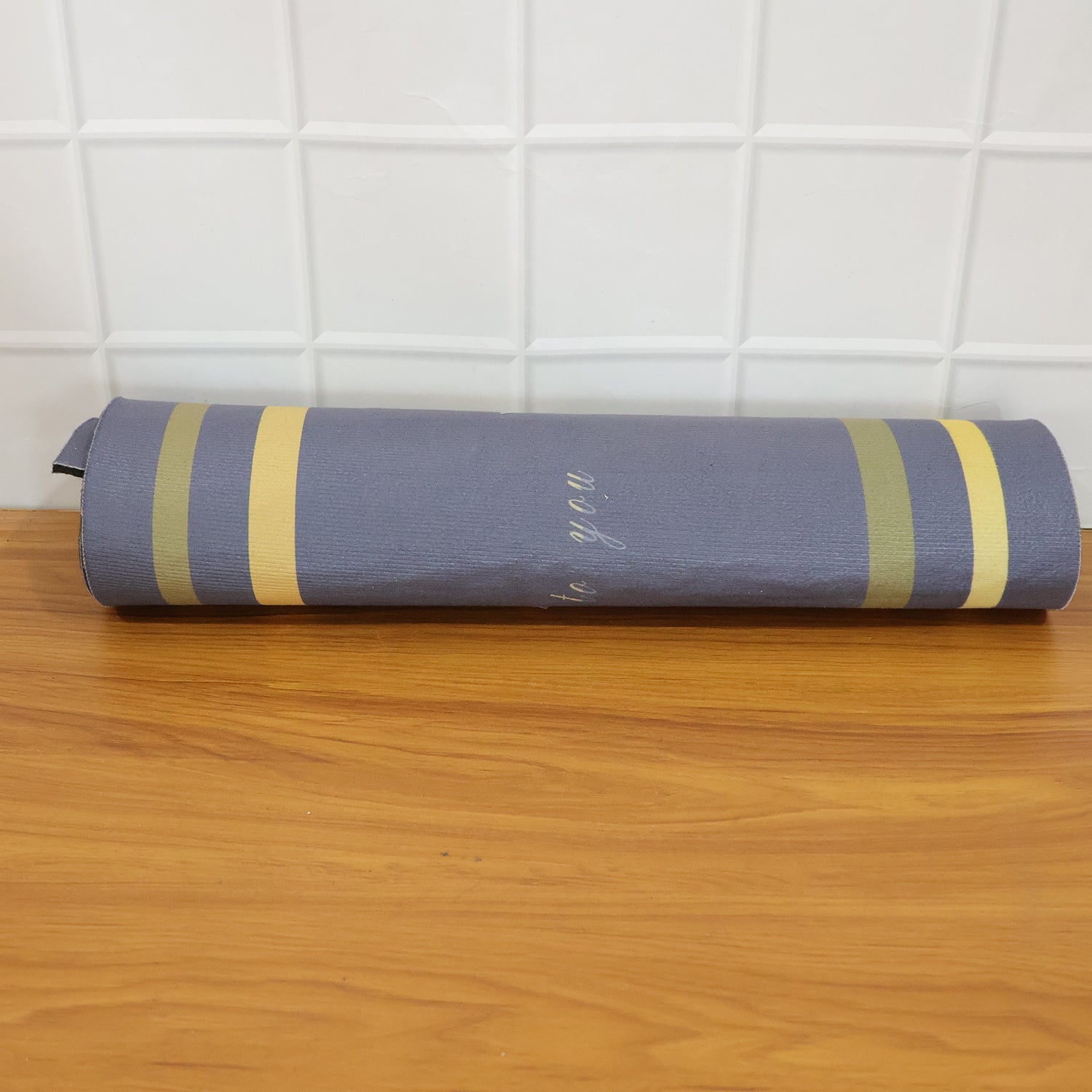 Wukusy premium anti-slip bathroom floor mat in beige, 79x50 cm, with textured surface for safety and comfort.