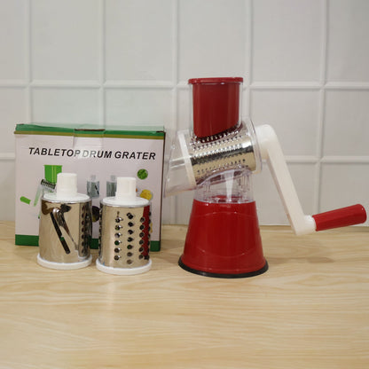Wukusy manual rotary drum grater and slicer set with three stainless steel drums for vegetable shredding and slicing.