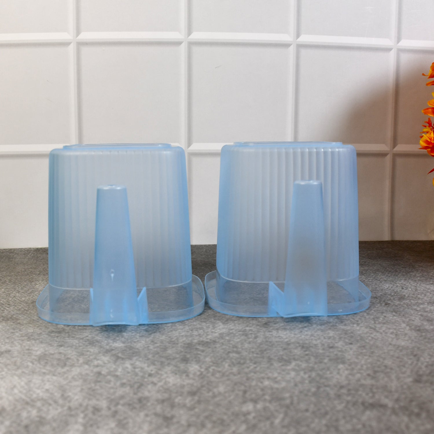 Set of four transparent plastic bathroom water mugs in mixed colors, each 1000 ml, by Wukusy for home improvement.
