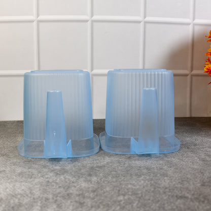 Set of four transparent plastic bathroom water mugs in mixed colors, each 1000 ml, by Wukusy for home improvement.
