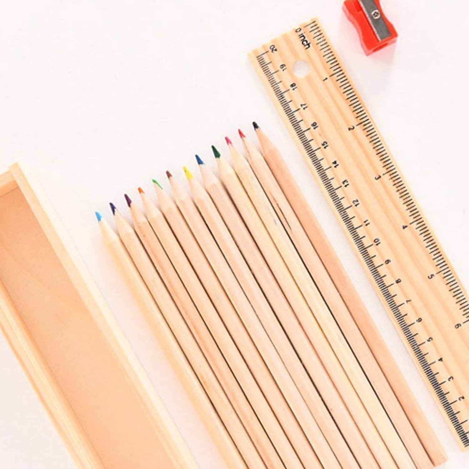 Colorful wooden pencil set with box, ruler, and sharpener by Wukusy, ideal for kids, artists, and architects.