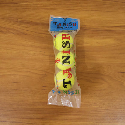 Wukusy premium tennis ball set with three bright yellow tennis balls on a plain background