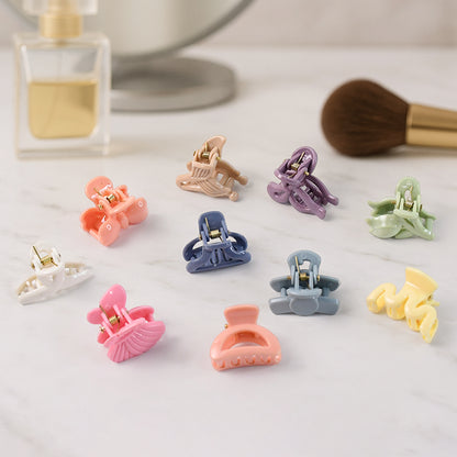 Set of six colorful Wukusy hair clips for girls and kids, featuring various fun and stylish hair accessory designs.