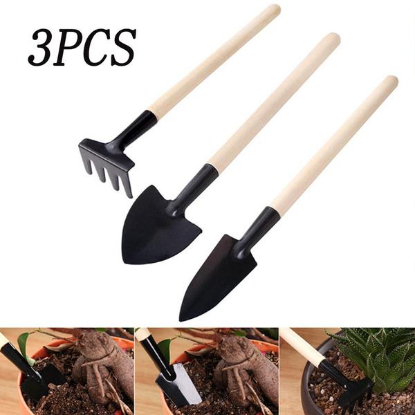 Wukusy kids garden tools set of 3 including trowel, shovel, and rake for outdoor play and gardening activities