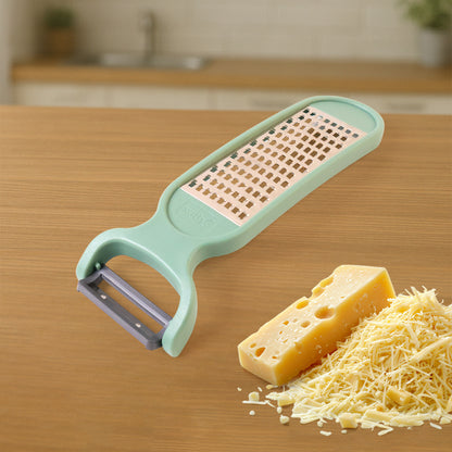 Wukusy Apex 2-in-1 vegetable grater and peeler combo tool for kitchen use, shown with stainless steel blades and ergonomic handle