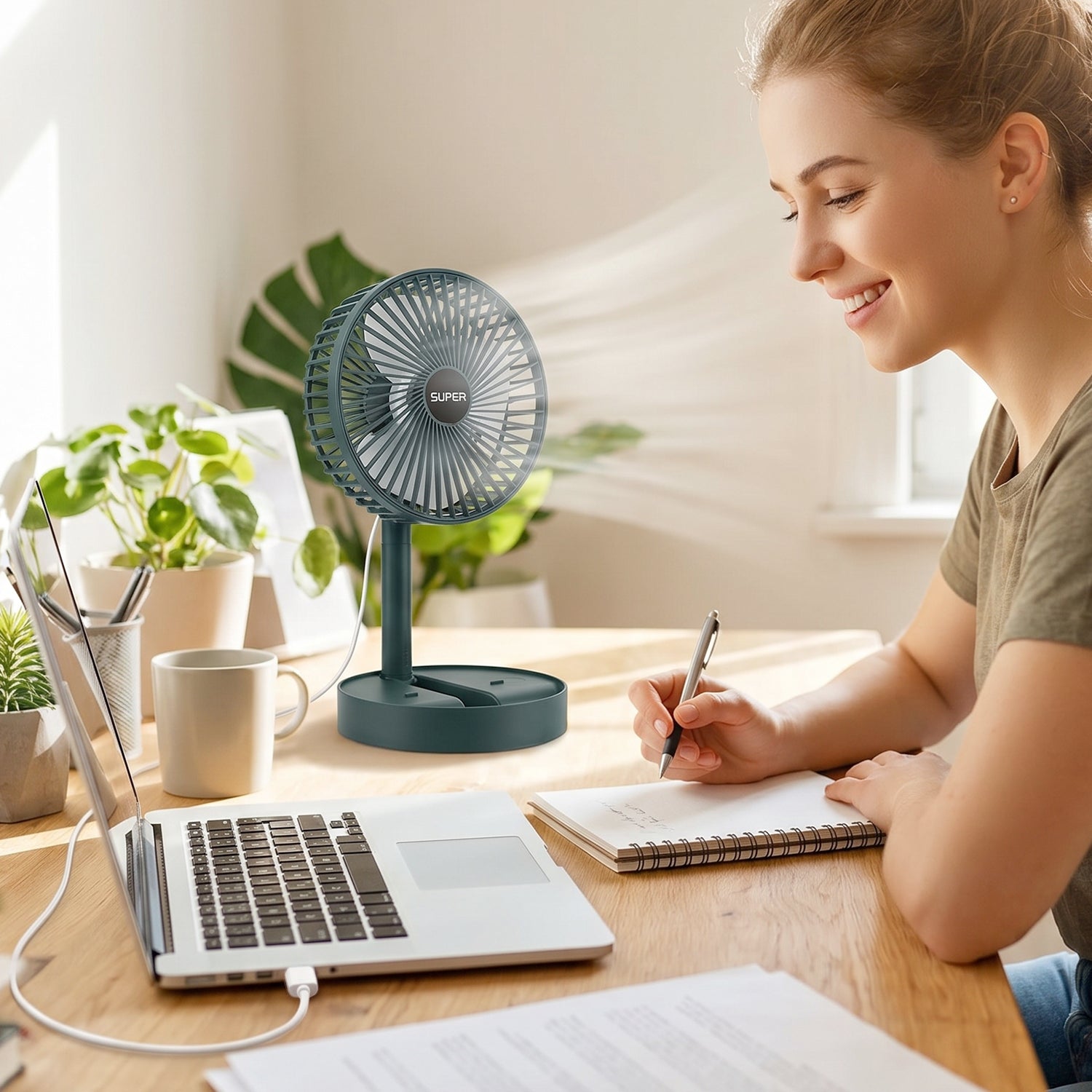 Portable Wukusy USB table fan with adjustable stand for desk cooling, suitable for office use, compact and lightweight design