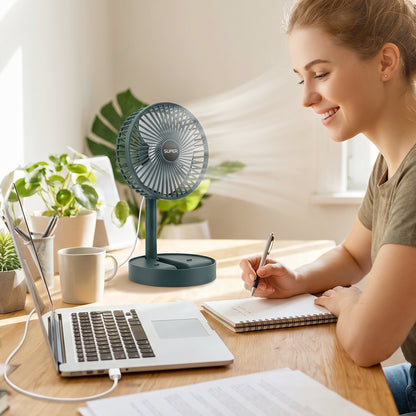 Portable Wukusy USB table fan with adjustable stand for desk cooling, suitable for office use, compact and lightweight design