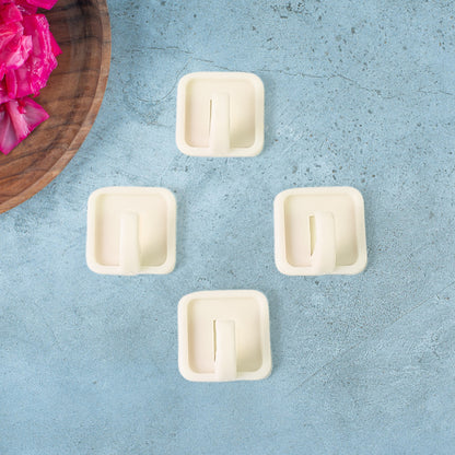 Set of 9 Wukusy adhesive wall hooks for hanging clothes and accessories, featuring strong adhesive backing for secure mounting.