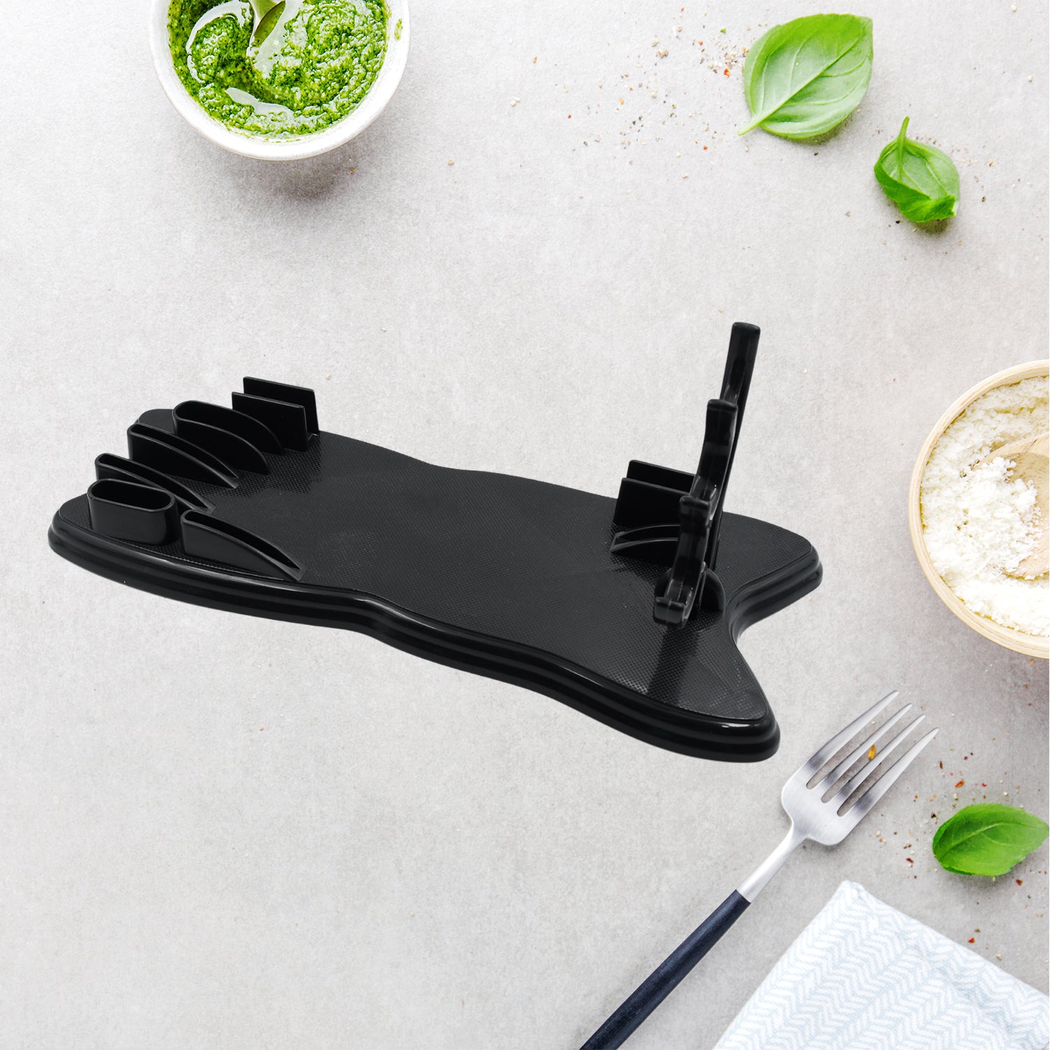 Wukusy plastic kitchen knife drawer organizer with multiple slots for easy storage and quick access to kitchen knives.