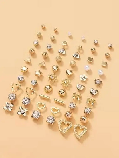 Gold plated multicolor pearl and AD stud earrings from Ekom, featuring 30 pairs of jewelry and watches accessories.